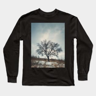 a tree on the snowy hill Long Sleeve T-Shirt